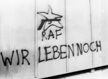 Sie leben sogar immer noch, wenn auch mehrere Jahrzehnte im Untergrund. Grafitto in Straßburg, 1977